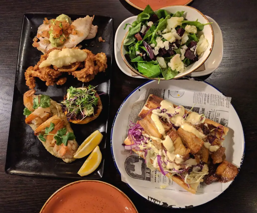 Spending One Beautiful Day in Auckland, New Zealand - Onehunga Cafe with seafood platter, beet salad, and pork belly po boy sandwich