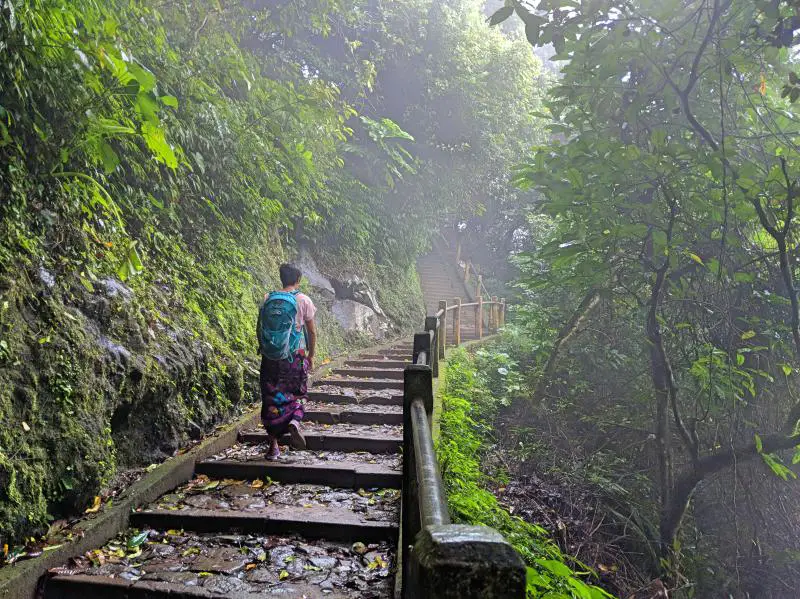 Jackie Szeto, Life Of Doing, walks up the steps of Pura Lempuyang Temple's Pura Lempuyang Luhur in Bali