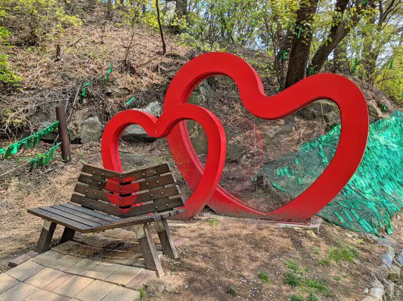 Incheon, South Korea One Day: Visit Wolmi Traditional Park where there is a heart shaped sculpture and bench