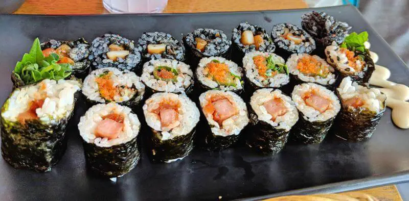 Three different kinds of kimbap rolls at School Food Blooming Mari in Myeongdong, Seoul, South Korea  