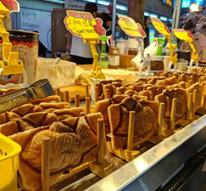 Taiyaki fish shaped desserts on display at the Myeongdong Night Market, Seoul, South Korea