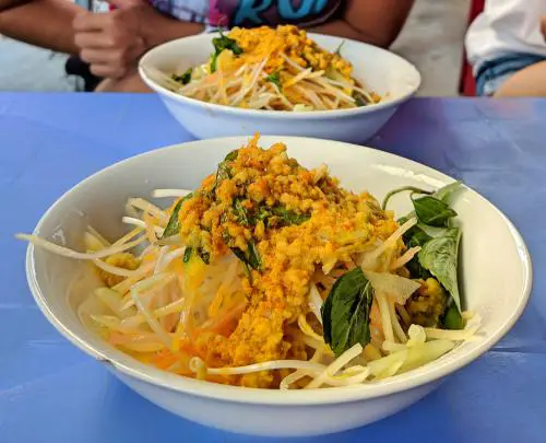 Bun kem is a delicious bowl of noodles with mashed fish and papaya salad at Bun Kem Ut Luon on Phu Quoc, Vietnam