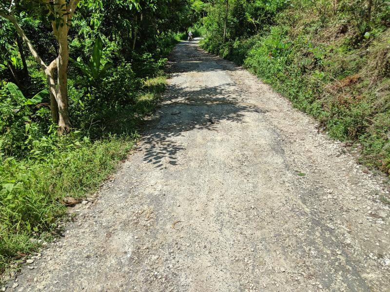 Potholes and loose gravel is the norm when driving on Nusa Penida, Bali, Indonesia. Be careful and drive slowly when driving a motorbike to prevent an accident.