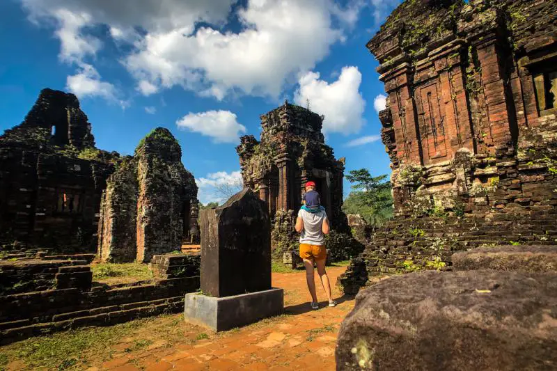 Walk through the My Son Sanctuary, one of the UNESCO sites in Vietnam, to see the Cham towers, which are made out of bricks and stone carvings.