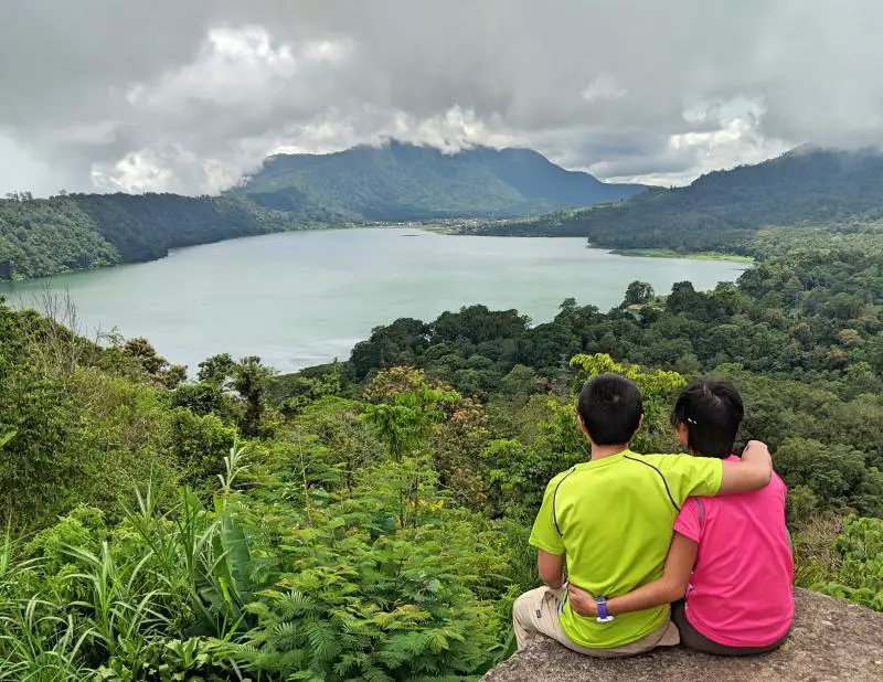 Justin Huynh and Jackie Szeto, Life Of Doing, overlook Tamblingan Lake from the platform area. The area is stunning with the greenery and the calm lakes.