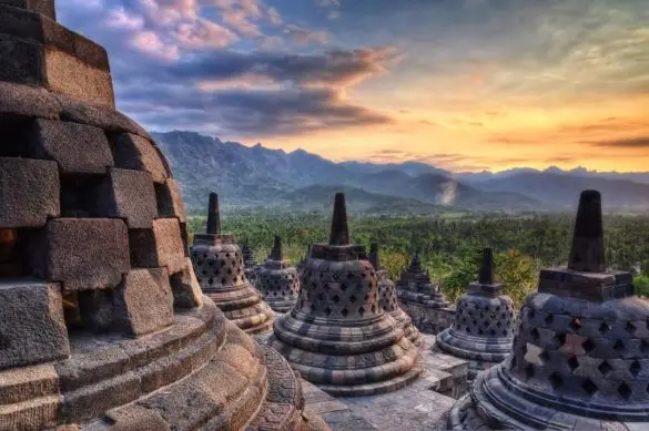 Viewing the sunrise from the the UNESCO site, Borobudur Temple in Java, Indonesia