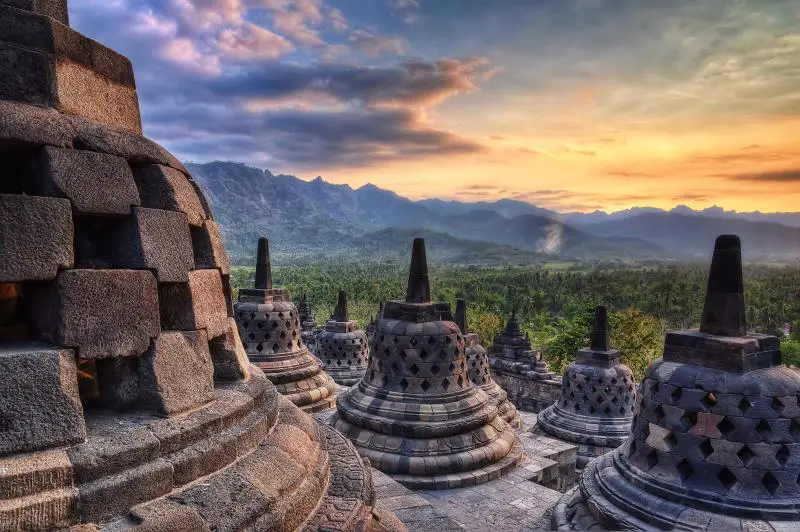 Viewing the sunrise from the the UNESCO site, Borobudur Temple in Java, Indonesia