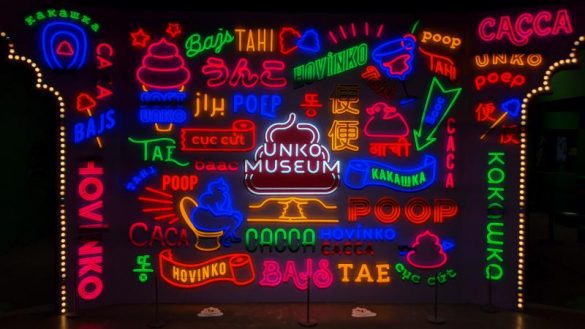 This is a neon sign that says poop in various languages. It's one of the highlights of visiting the Unko Museum in Tokyo, Japan.