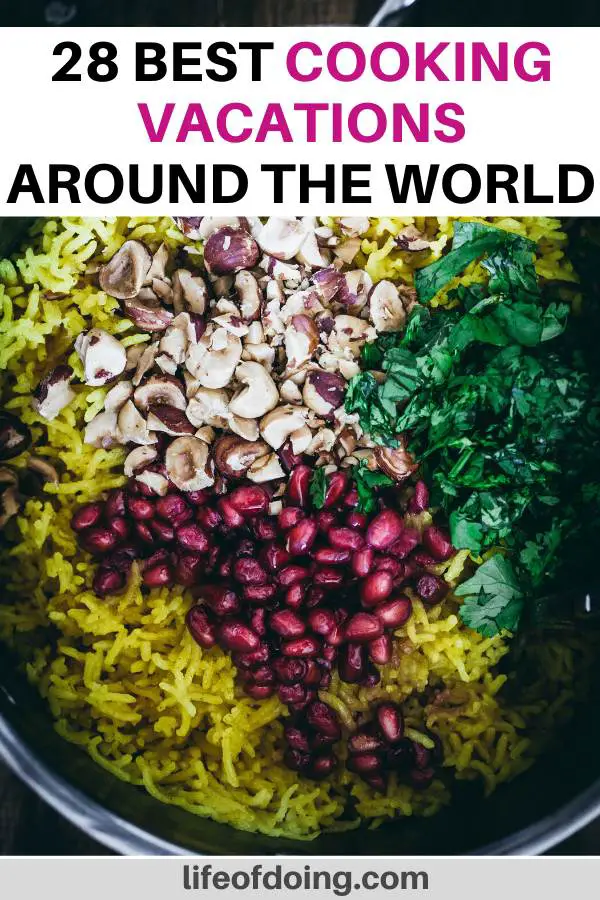 We're sharing the top 28 cooking classes around the world to take on your vacation. Whether you're in Asia, Africa, or South America, there is a cooking class for everyone to enjoy on their culinary vacation. Photo is of yellow rice with pomegranate seeds, cilantro, and nuts.