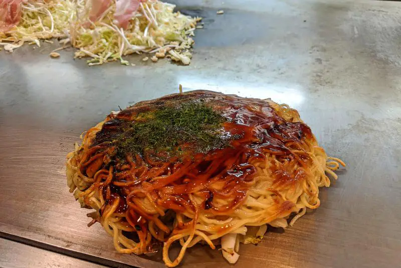 Mitchan Sohonten is the best okonomiyaki in Hiroshima. This restaurant serves delicious okonomiyaki and is a best restaurant to eat in Hiroshima.