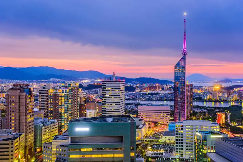 During your 1 week in Kyushu itinerary, check out the Fukuoka skyline to see the purple and orange skies during sunset.