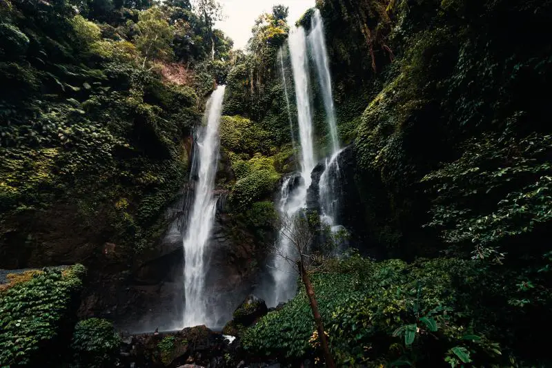 Waterfall cascades at Sekumpul Waterfall in Bali, Indonesia