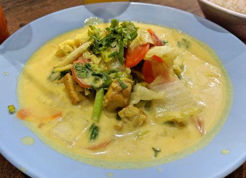 Yellow curry with tempeh and vegetables from Naughty Nuri's Warung in Ubud, Bali.