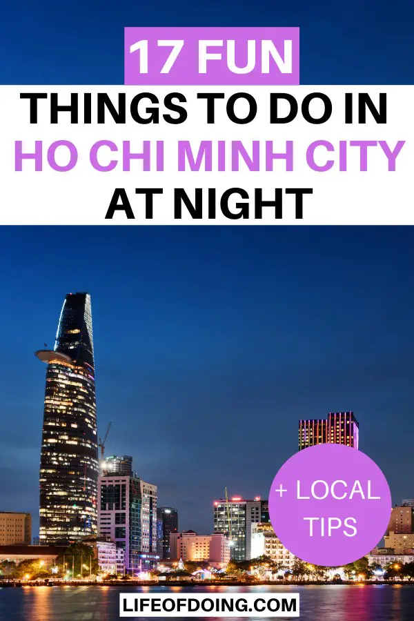 View of Ho Chi Minh City skyline at night with the lit skyscraper buildings over the Saigon River