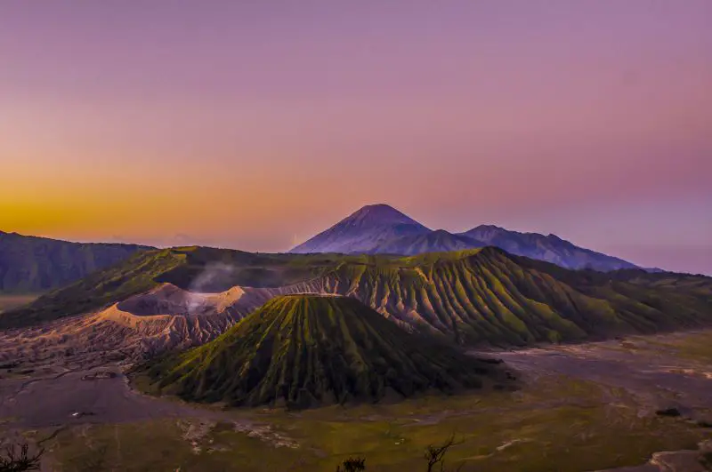 Mount Bromo is one of the incredible hikes in Indonesia to experience, with the volcanic craters and purple and orange skies for sunrise
