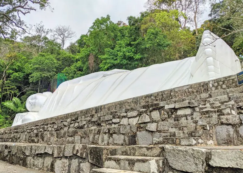 White reclining Buddha is one of the highlights of hiking up Ta Cu Mountain in Vietnam