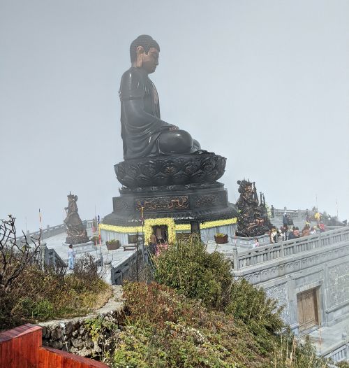 A tall bronze Buddha statue at Sun World Fansipan Legend in Sapa, Vietnam