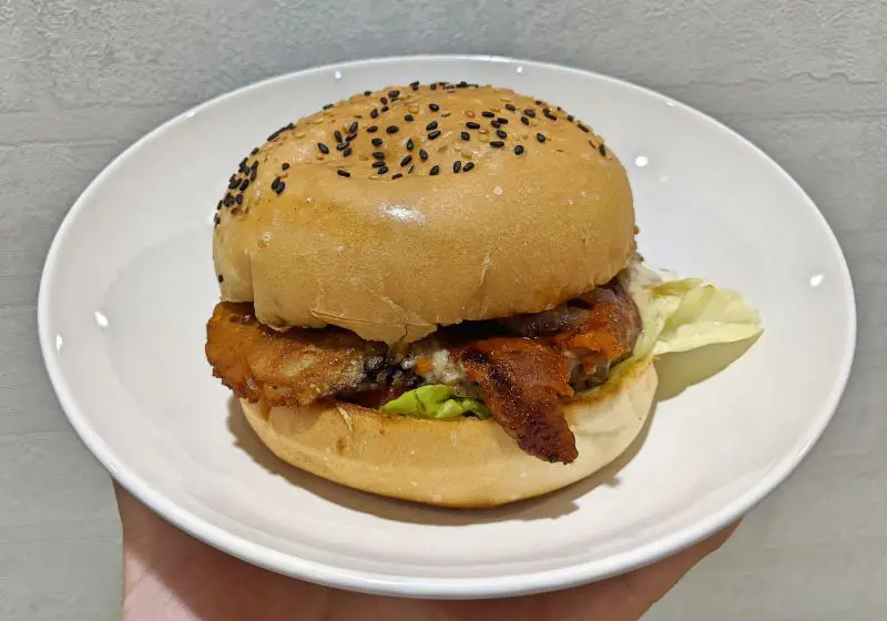 Vegan burger with faux bacon in a sesame bun from Terra Vegan Burgers, Ho Chi Minh City, Vietnam