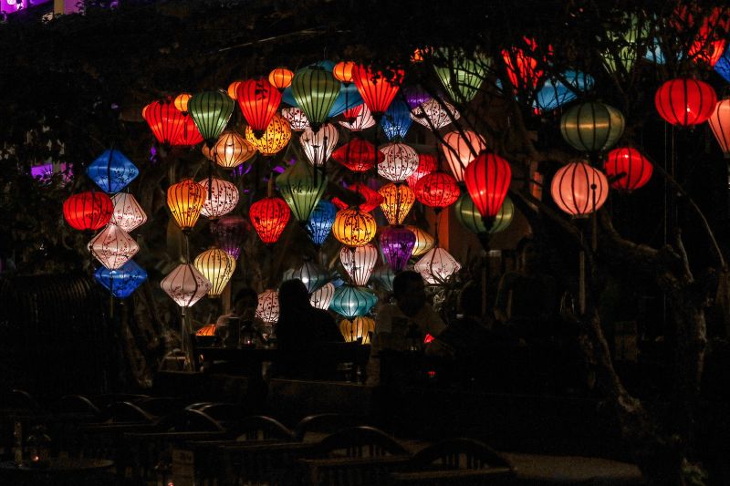 Colorful lanterns lit up at night at a restaurant in Vietnam