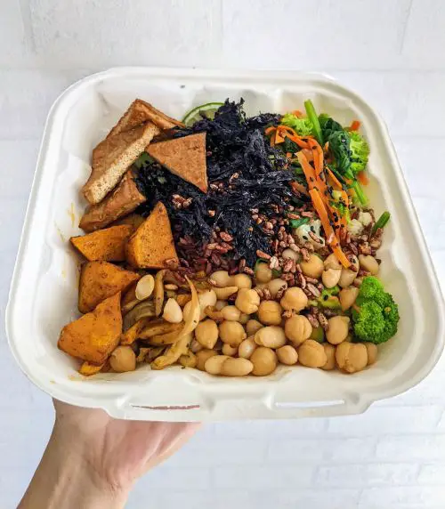 This Buddha Bowl has red rice, tofu, potatoes, chickpeas, broccoli, chickpeas, and shredded seaweed from Zeroism in Ho Chi Minh City