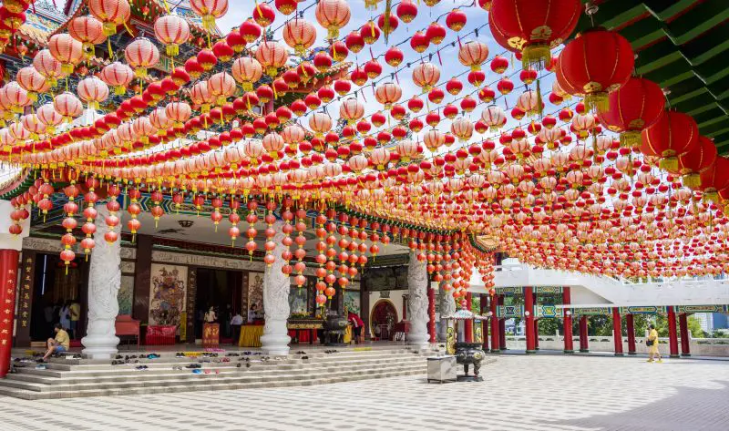 Visiting Asia places in the winter season to see the colorful red and yellow lanterns for Chinese New Year.