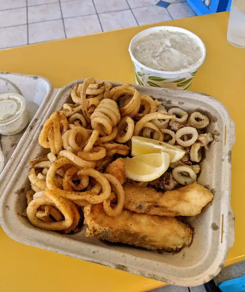 Fried fish and fried calamari with curly fries and a cup of clam chowder at Splash Cafe in Pismo Beach, California