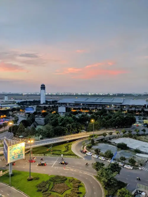 View of the Tan Son Nhat Airport (Ho Chi Minh City Airport) from the Ibis Saigon Airport Hotel at sunset