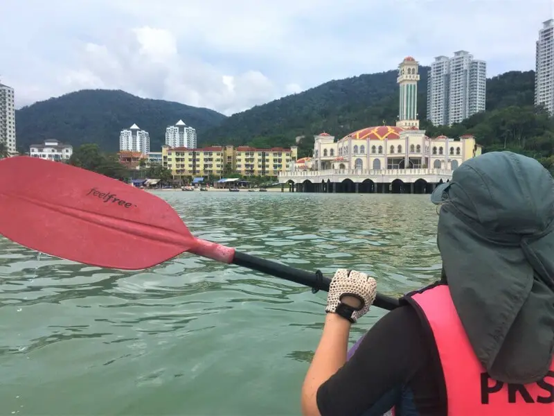 A kayaker paddling to the floating mosque in Penang, Malaysia