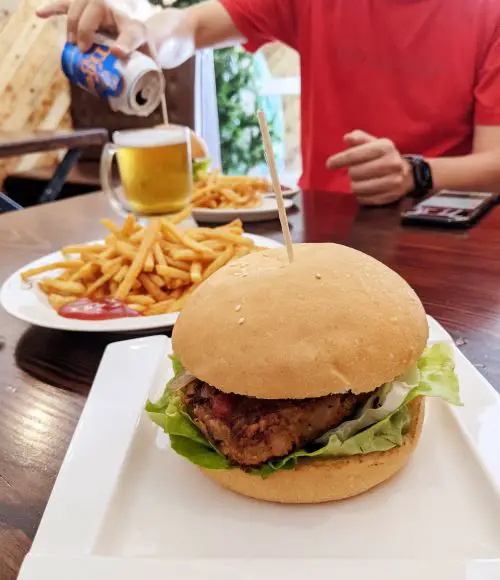 A vegetarian burger and a side of french fries at Burger House in Dalat, Vietnam