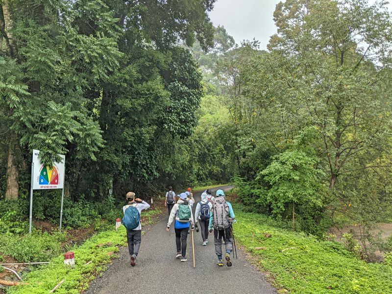 A group of hikers hiking into the Bu Gia Map National Park in Binh Phuoc, Vietnam