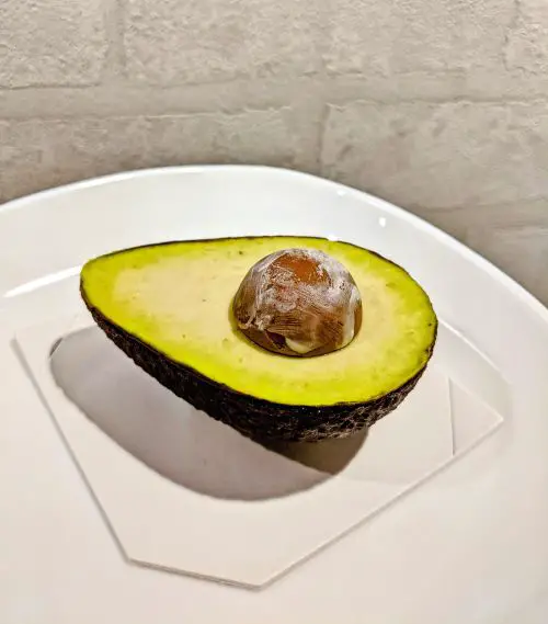 A dessert shaped as half an avocado from Ivoire Pastry