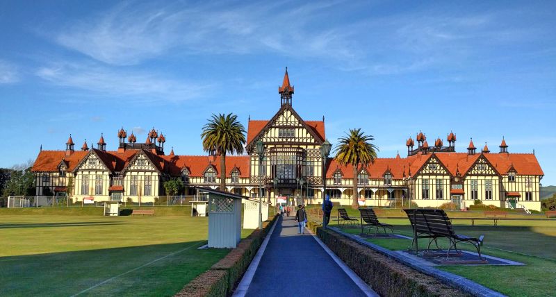 The Rotorua Museum is a building with timber framing and an orange color roof in Rotorua, New Zealand