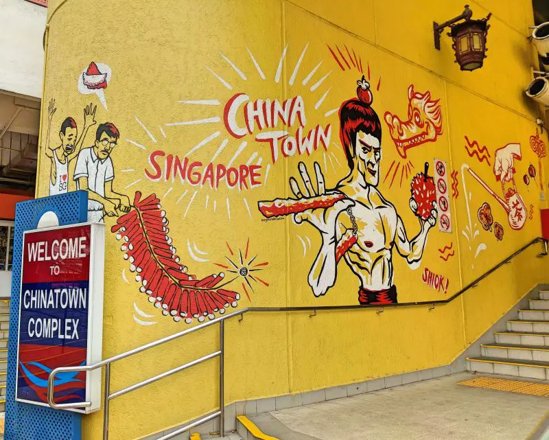 Street art of Singapore's Chinatown Complex with Bruce Lee holding a durian