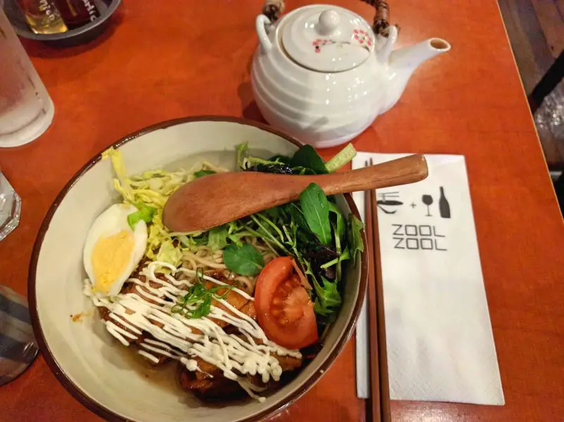 Teriyaki chicken zoolmen noodles with salad and hard boiled egg at Zool Zool Ramen in Auckland, New Zealand