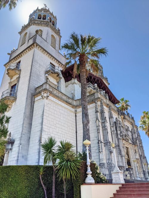 A side view of the white and gold Casa Grande building at Hearst Castle, San Simeon, California
