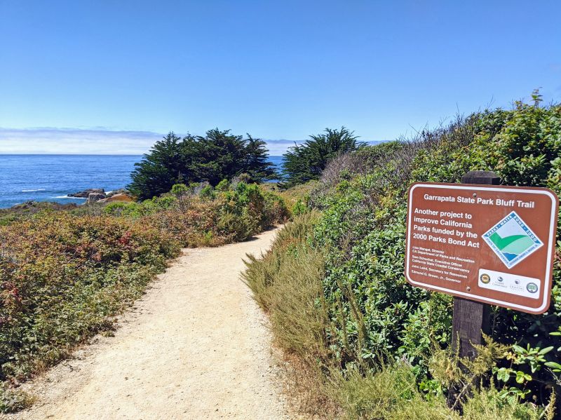 Sign of Garrapata State Park Bluff Trail and the hiking trail
