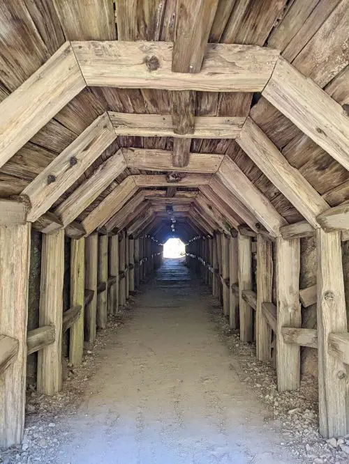 A wooden tunnel that leads to Partington Cove in Big Sur, California