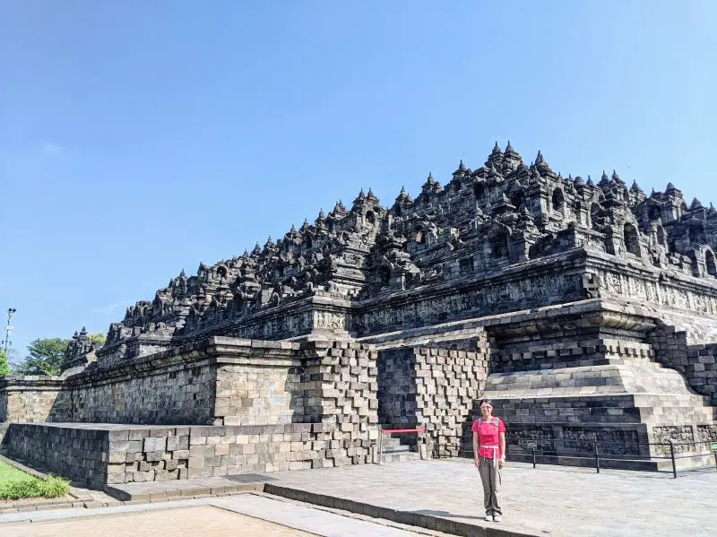 Jackie Szeto, Life Of Doing, stands at the base of the Borobodur Temple