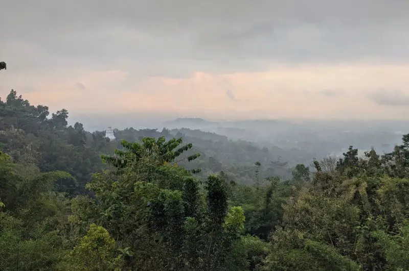 A hazy layer of clouds at Setumbu Hills sunrise point