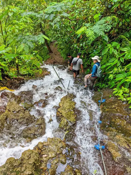 Jackie Szeto, Life Of Doing, and a guide walk along the edge of the Tumpak Sewu Waterfall