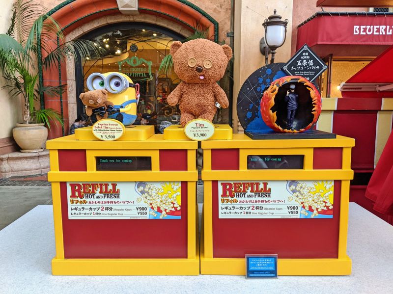 Three popcorn souvenir box choices at Universal Studios Japan - Bob the Minion with teddy bear, teddy bear, and Jujutsu Kaisen