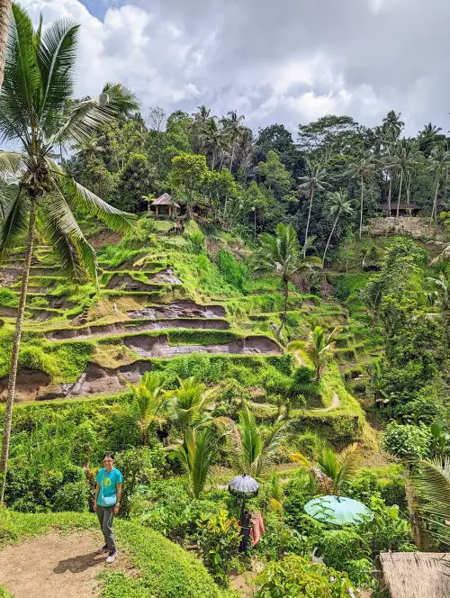 Jackie Szeto, Life Of Doing, stands next to the Tegallalang rice terraces in Ubud