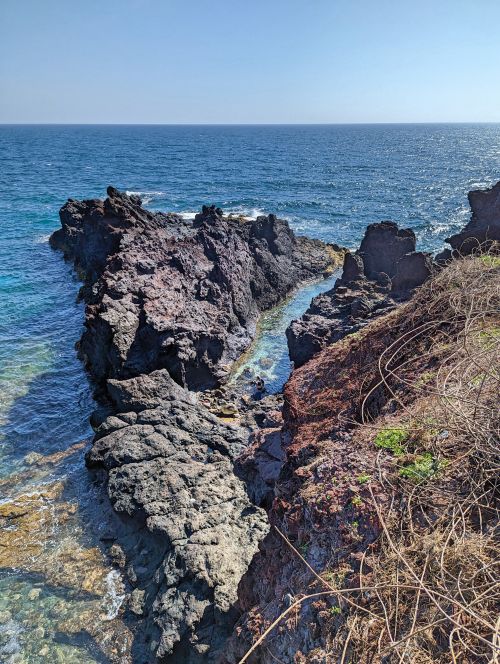 The Happy Spot on Phu Quy Island is two lava rocks between a small ocean stream of water and located next to the abandoned bunker