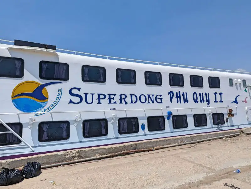 A white Superdong Phu Quy II speedboat