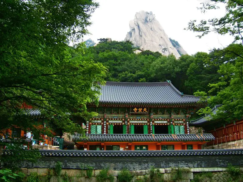 A temple in front of one of the mountain peaks at Bukhansan National Park, Seoul, Korea