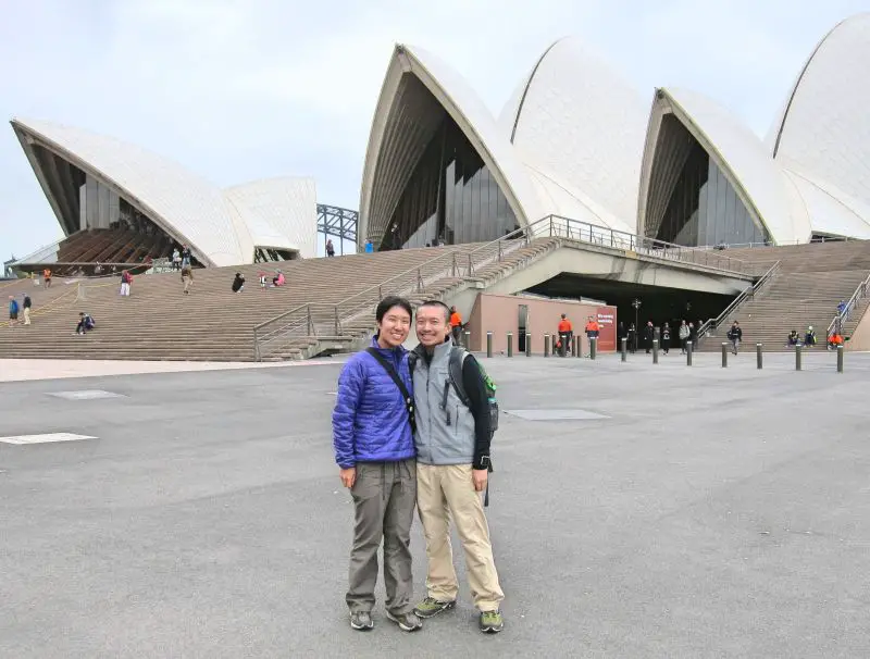 Jackie Szeto and Justin Huynh, Life Of Doing, stand in front of the Sydney Opera House in Sydney, Australia