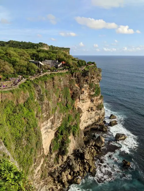 A walking path along the edge of the cliff of Uluwatu Temple in Bali