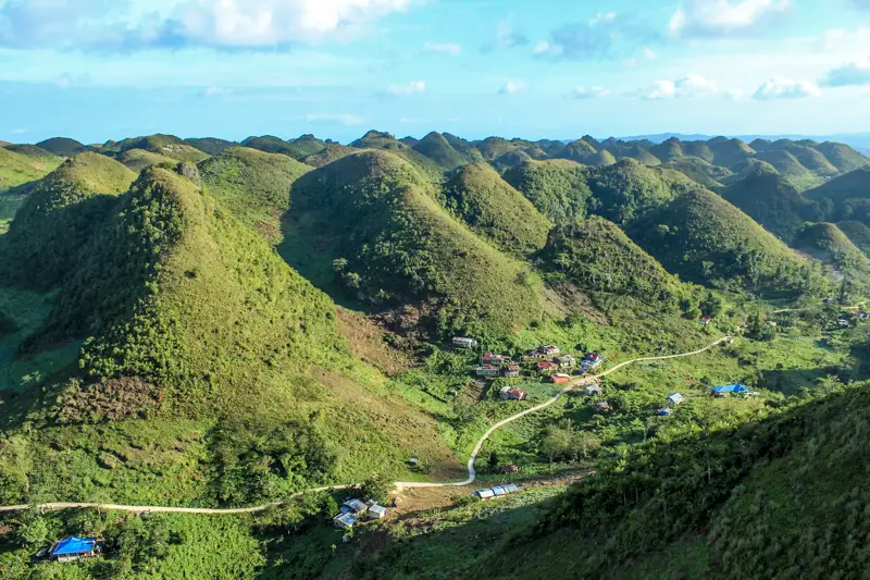 Many green hills from Osmena Peak in Cebu, Philippines