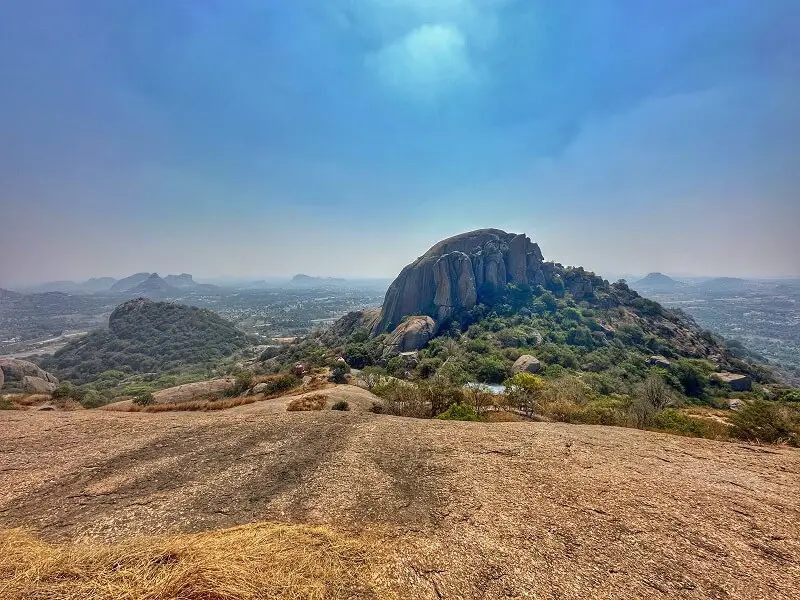 Views of rounded mountains along the Ramadevara Betta Trek in India