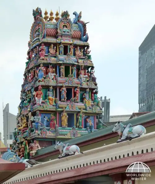 A colorful tower with deities at Sr Mariamman Temple in Singapore Chinatown area